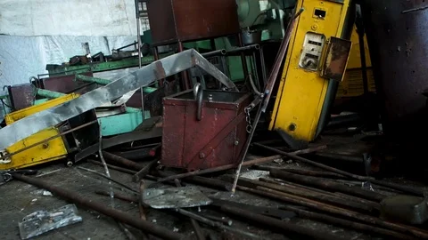 Abandoned old, useless details of machine tools in workshop, metal scrap. Many Stock Footage 100337383