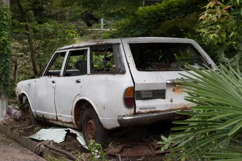 Abandoned old white car Stock Photos