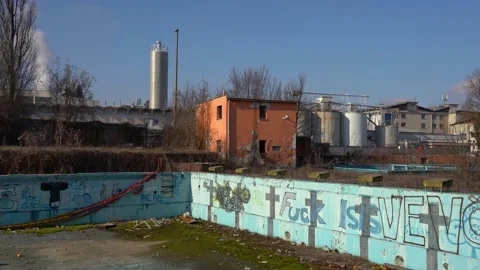 Abandoned Olympic empty outdoor pool Stock Footage 169576533