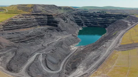 Abandoned Opencast Coal Mine Pit in Ffos-y-Fran, Aerial Shot Видео 341584911