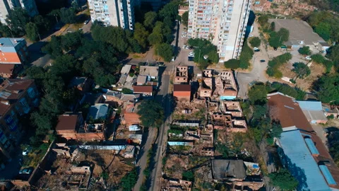Abandoned partially destroyed brick burned down houses in the quarter city Stock Footage 119503174