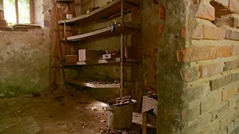 Abandoned place smithy. Behind an old brick wall opens a room. Stock-Footage 80797314