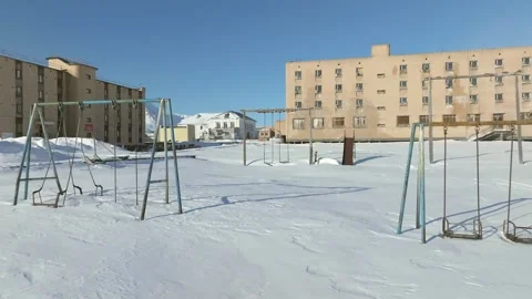 Abandoned Playground in Snowy Arctic Ghost Town 4k Drone Footage Vidéo 338265415