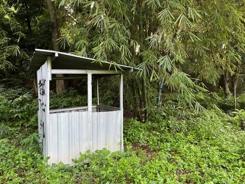 Abandoned post in the middle of the woods. Stock Photos