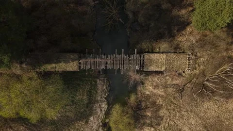 Abandoned Railway Bridge – Top Down Forward Aerial Stock Footage 332698243