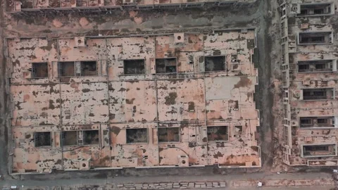 Abandoned Rectangular Complex Top-Down Drone, Grid Roof Voids Between Service Video stock 323920913