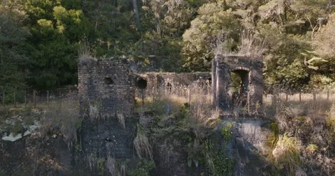 Abandoned refinery structure of old gold mine, Luck at Last Mine, Whangamata, Stock Footage 279424043