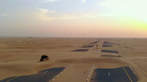 Abandoned road in a desert Stock Footage 94460179