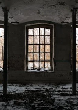 Abandoned room with broken window. Stock Photos