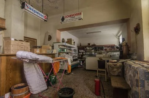 Abandoned room with objects of a grocer Stock Photos