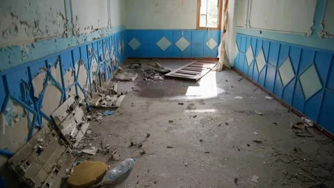 Abandoned room with peeling blue tile walls, neglected interior space 스톡 동영상 342087681