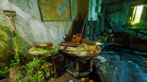 An abandoned room with a table filled with miscellaneous items Stock Footage 250330083