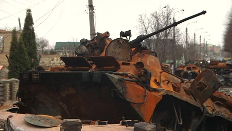 Abandoned russian tank covered with a rust in Bucha Stock Footage 218376961