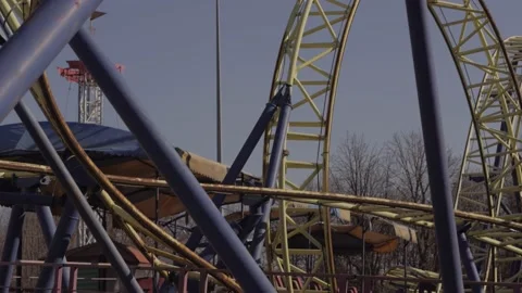 An abandoned, rust-covered roller coaster ride in an abandoned amusement park. Stock Footage 151511983