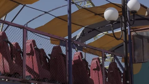 An abandoned, rust-covered roller coaster ride in an abandoned amusement park. Stock Footage 151512034
