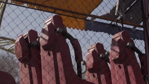 An abandoned, rust-covered roller coaster ride in an abandoned amusement park. Stock Footage 151588105