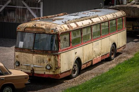 Abandoned rust covered trolleybus or bus Stock Photos