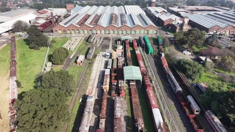 Abandoned rusty old trains cemetery aerial view Stock Footage 339304604