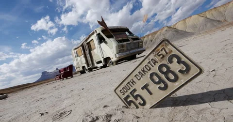 Abandoned RV in Badlands Setting Time Lapse in 4K 4096x2160with License Plate Stock Footage 45431342