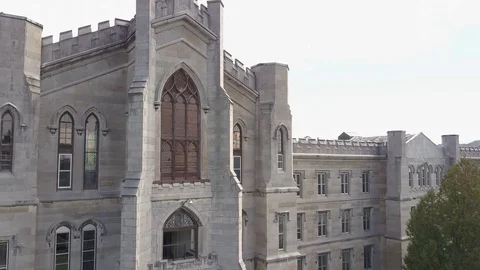 Abandoned Sanitarium old building top windows aerial Stock Footage 80402985