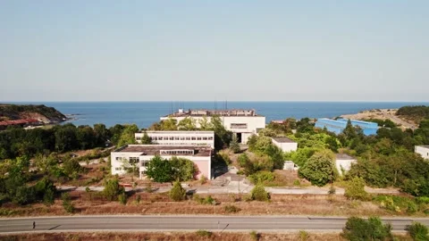 Abandoned Seaside Industrial Storage Complex Factory Bright Sunny Day Coast Blue Stock Footage 235657296
