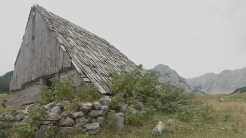 Abandoned Shepherd's Hut in a Mountainous Setting Stock Footage 289665217