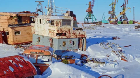 Abandoned ship graveyard covered with winter snow Stock Footage 337038288