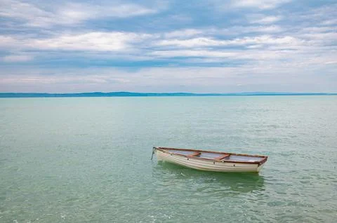 Abandoned sloop on a large lake Stock Photos