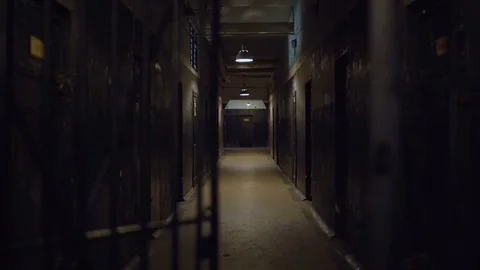 Abandoned Soviet and Nazi prison cell hallway Stock Footage