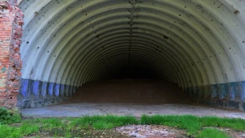 Abandoned soviet nuclear missile base. Concrete bunker entrance in a forest Stock-Footage 347016850