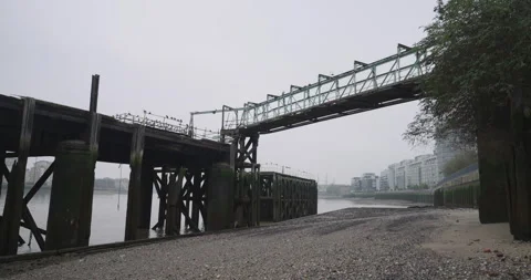 Abandoned Structure on the River Thames in London on an Overcast Day Stock Footage 291279742
