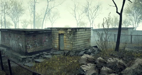 Abandoned structures in a misty landscape with overgrown vegetation 스톡 동영상 306289077