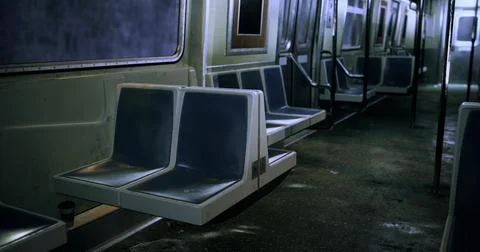 Abandoned subway train interior revealing faded seats and silent atmosphere Stock Illustration