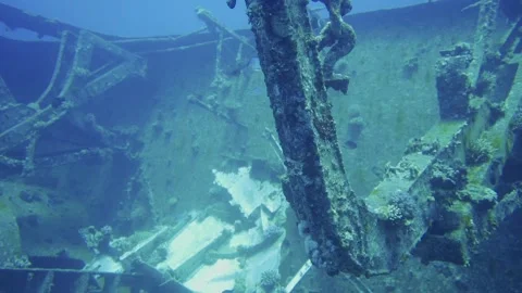 Abandoned sunken ship in deep blue sea Video stock 241086802