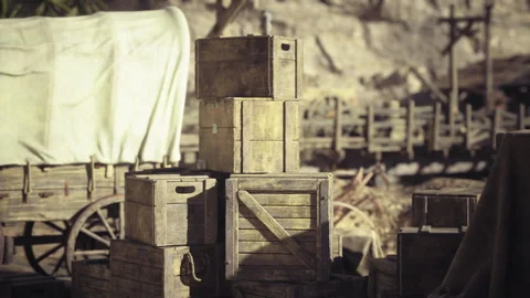 Abandoned supply station in Namibia featuring aged wooden boxes and worn carts 스톡 동영상 340663266