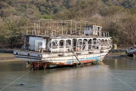 Abandoned tourist boat on Elefanta Island near Mumbai, India Stock Photos