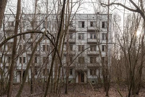 Abandoned tree-lined yard of Chernobyl 2. Chernobyl, Ukraine. Stock Photos