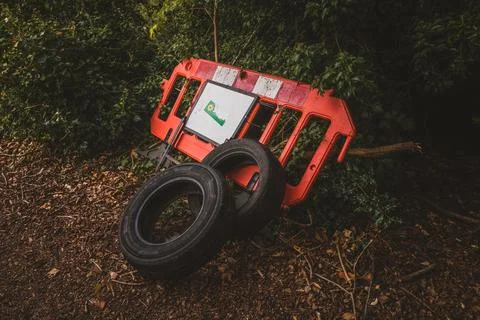 Abandoned tyres in the forest. Stock Photos