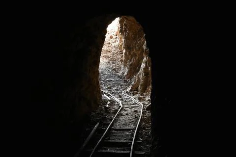 Abandoned Underground Mine Exit with Rail for Ore Carts in Arizona Abandon... Stock Photos