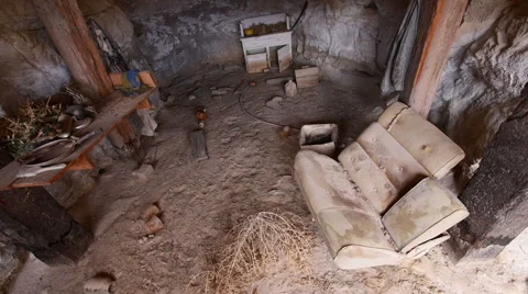 Abandoned Uranium Mine Dwelling in Wild American West Chair and Artifacts Stock Footage 40973710