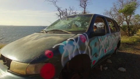 Abandoned van, car, destroyed, wrecked, and graffitied. Graffiti Art. Video stock 72073612