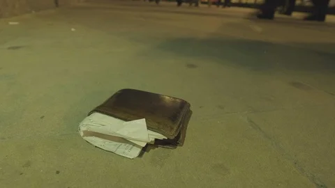 Abandoned wallet at night Stock Footage 97765276