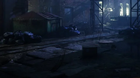 Abandoned warehouse with garbage and wet ground during night time Stock Footage 344550309