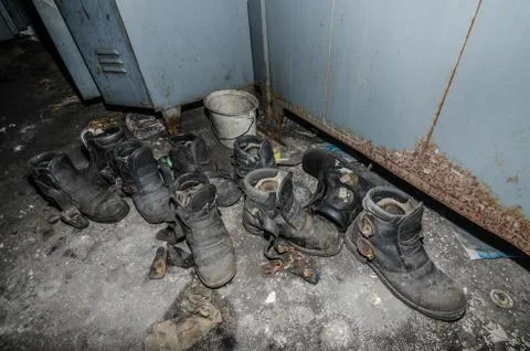 Abandoned work shoes Stock Photos