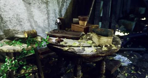 An abandoned workspace features a rustic table covered in leaves and papers Stock Illustration