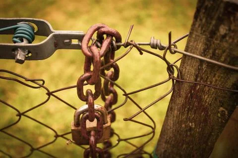 Abandoned zone with rusty chain and padlock Stock Photos