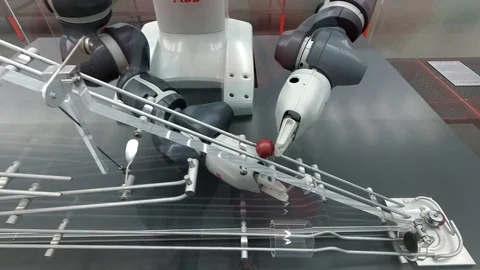 ABB robot demonstrating performing a complicated 2 arms movement Stock Footage 108137069