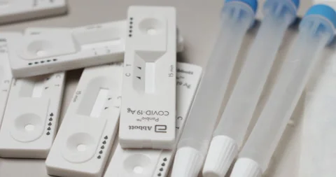 Abbott Covid-19 test kit- Cartridge with cotton swab and testing fluid Video stock 172135007