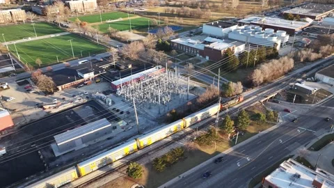 Abbott Power Plant with Train N to S Truck Stadium &amp; State Farm Center Stock Footage 273607813