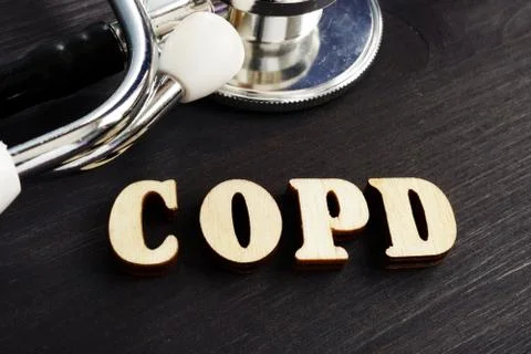 Abbreviation COPD Chronic obstructive pulmonary disease from wooden letters. Stock Photos